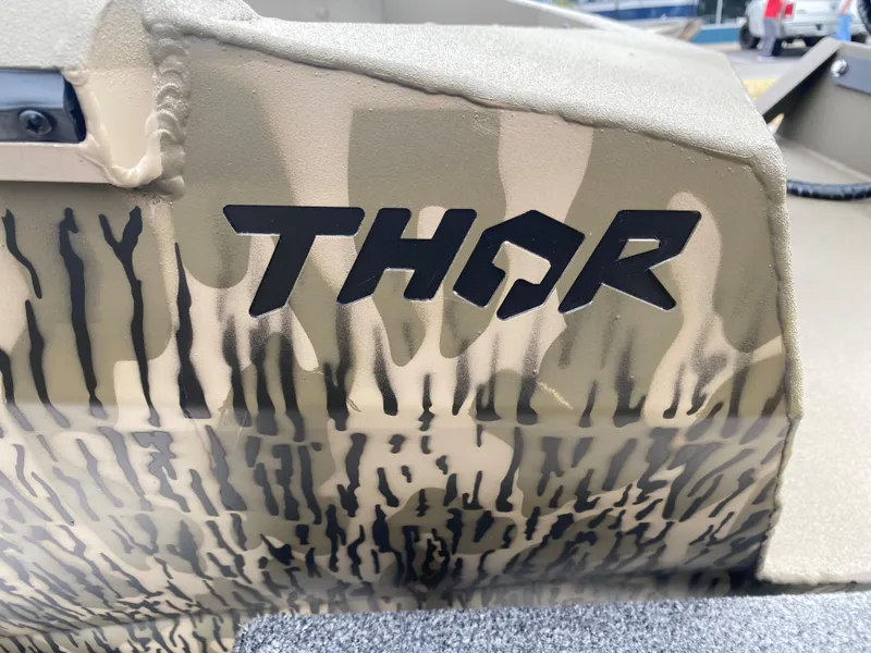 Slide: The Image of 2023 Thor Lake Hammer boat with camouflage design and logo - 3