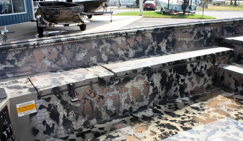 Slide: The Image of 2023 Thor Lake Hammer boat interior with camouflage design. - 3