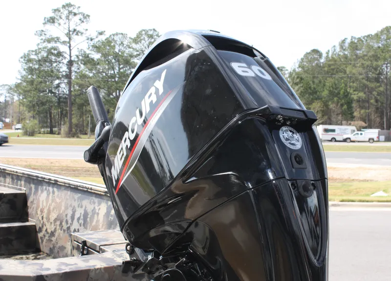 Slide: The Image of 2023 Thor Lake Hammer boat motor, Mercury 60 horsepower, mounted on a boat. - 5