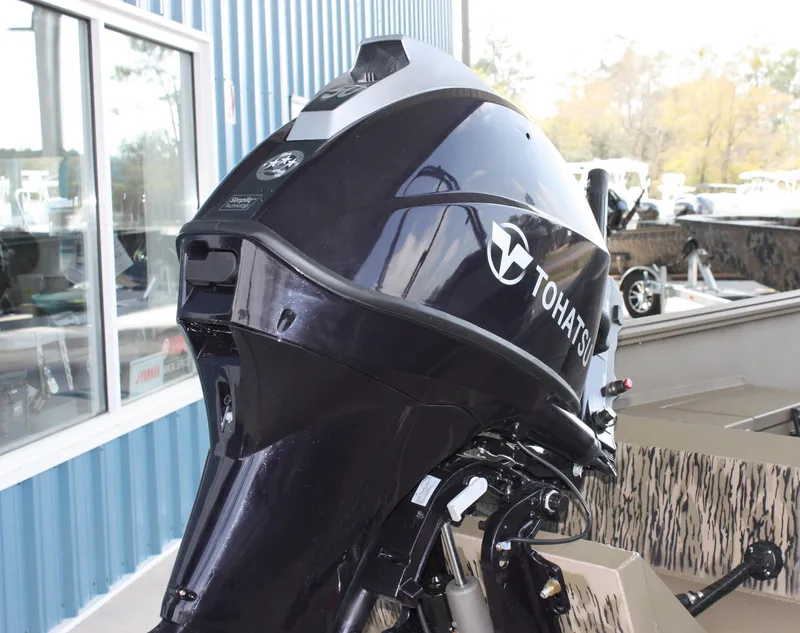 Slide: The Image of 2023 Thor Lake Hammer outboard motor displayed at a dealership. - 7