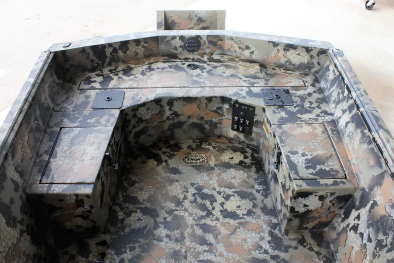 Slide: The Image of 2023 Thor Lake Hammer boat interior with camouflage design. - 4