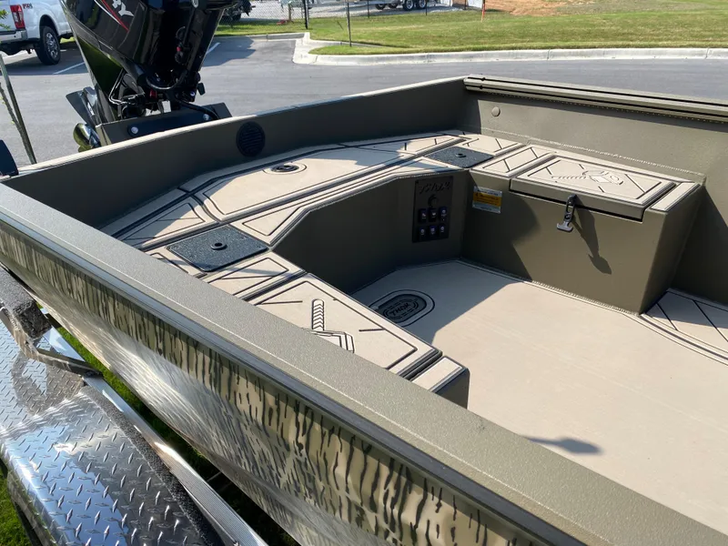 Slide: The Image of 2023 Thor Lake Hammer boat interior with storage compartments and control panel. - 4