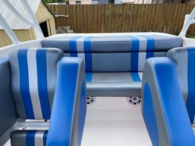Slide: The Image of 2007 Glasstream 273 XS boat interior with blue and gray seating. - 14