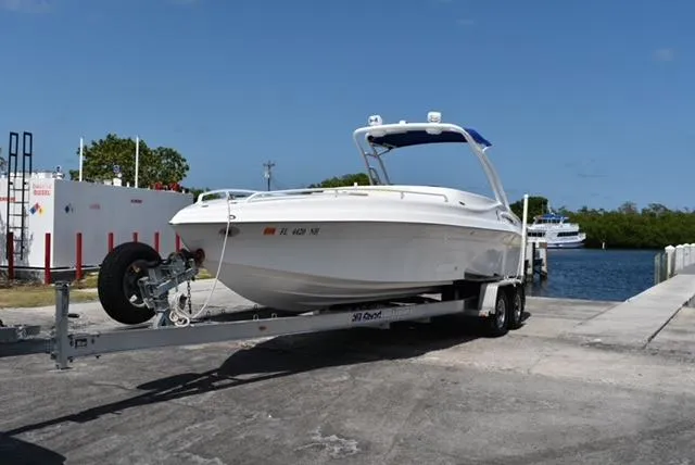 Slide: The Image of 2007 Glasstream 273 XS boat on trailer near water, ready for launch. - 3
