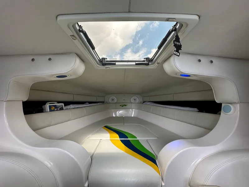 Slide: The Image of Interior cabin of 2007 Glasstream 273 XS boat with skylight and colorful design. - 31
