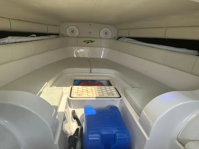 Slide: The Image of 2007 Glasstream 273 XS boat interior with seating and storage compartments. - 32