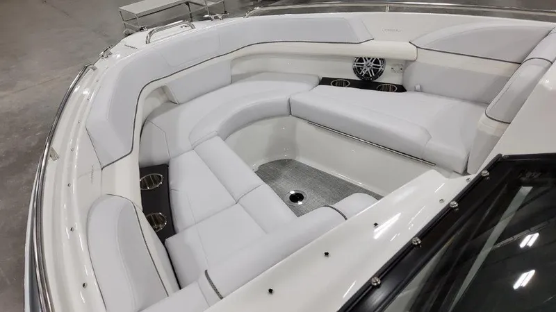 Slide: The Image of 2023 Formula 240 Bowrider with spacious white seating and modern design. - 24
