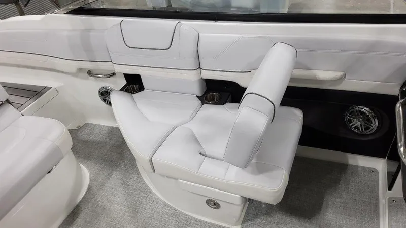 Slide: The Image of 2023 Formula 240 Bowrider interior with white seating and modern design. - 28