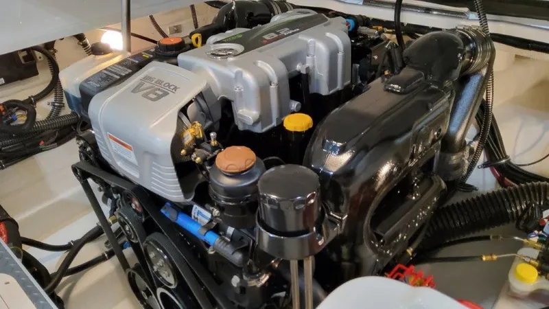 Slide: The Image of 2023 Formula 240 Bowrider engine compartment showcasing powerful V8 engine. - 31