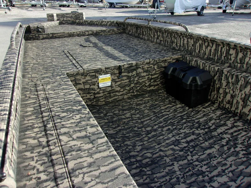 Slide: The Image of 2023 Legendcraft Boats Ambush Elite 1652 MD with camouflage interior design. - 6