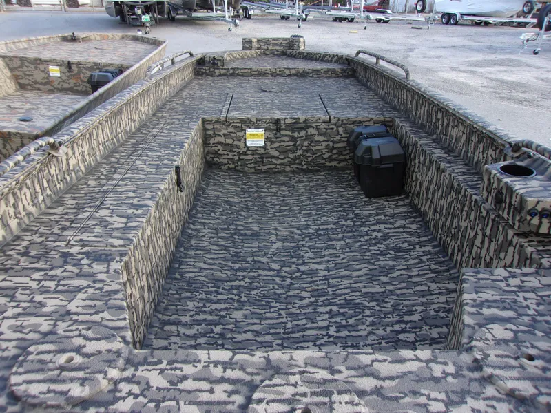 Slide: The Image of 2023 Legendcraft Boats Ambush Elite 1652 MD with camouflage interior design. - 7