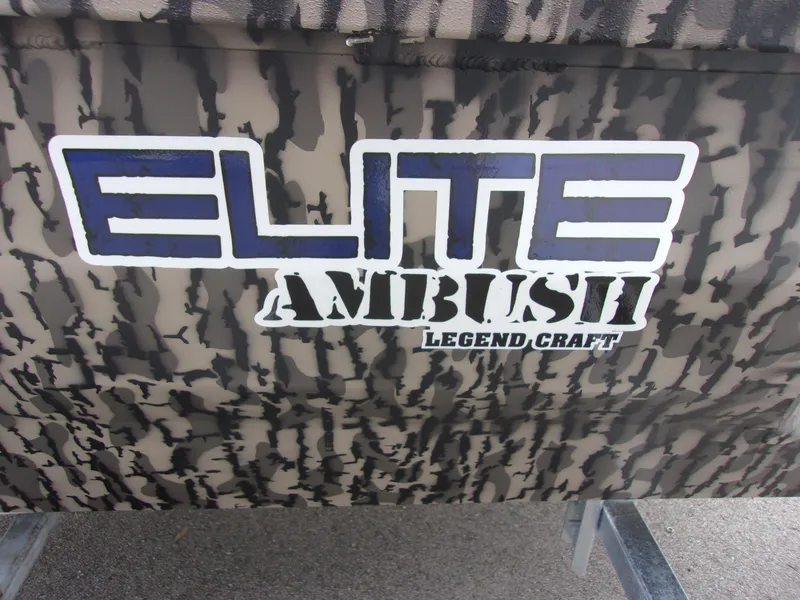 Slide: The Image of 2023 Legendcraft Ambush Elite 1652 MD boat with camouflage design and bold lettering. - 9