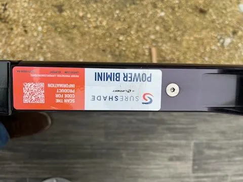 Slide: The Image of 2024 Sweetwater 2286SFL SureShade Power Bimini label with QR code for product information. - 8