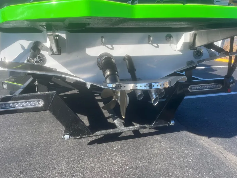 Slide: The Image of Rear view of 2023 Centurion Fi23 boat showing propeller and exhaust system. - 5