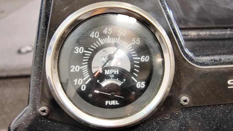Slide: The Image of Speedometer and fuel gauge of 2023 Lowe Stinger 198 boat dashboard. - 16