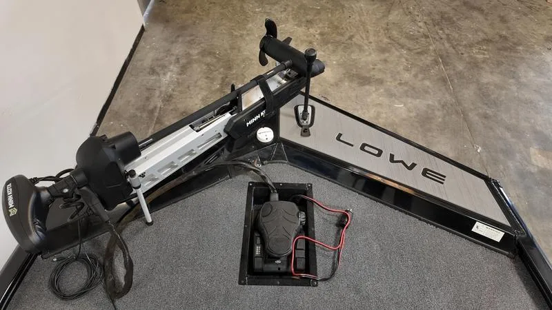 Slide: The Image of 2023 Lowe Stinger 198 boat with trolling motor and battery compartment. - 4