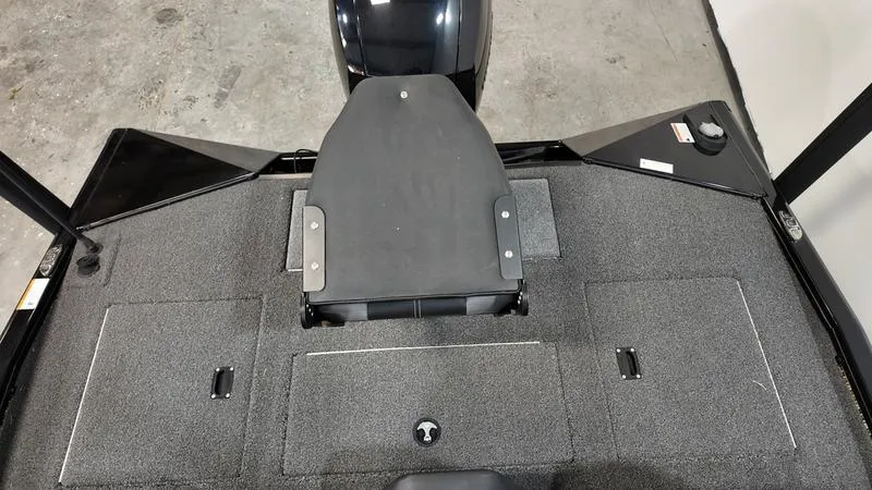Slide: The Image of 2023 Lowe Stinger 198 boat deck with seating and storage compartments. - 6