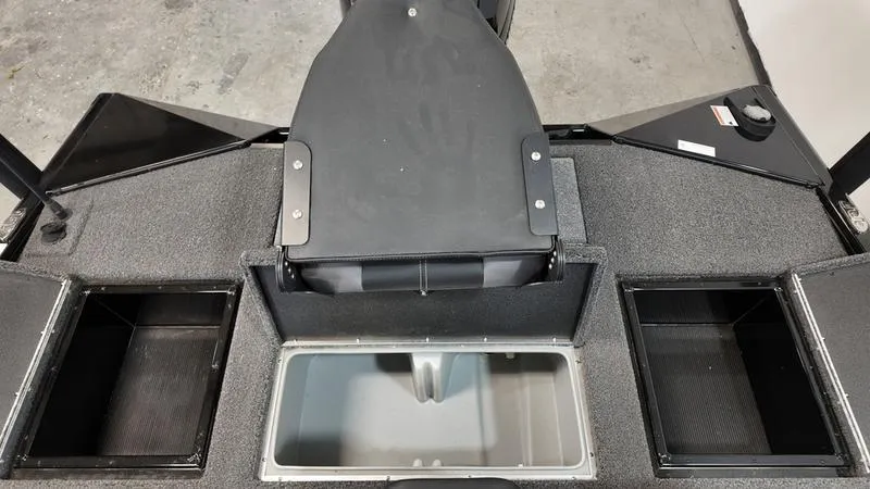 Slide: The Image of 2023 Lowe Stinger 198 boat interior with storage compartments and seating. - 7
