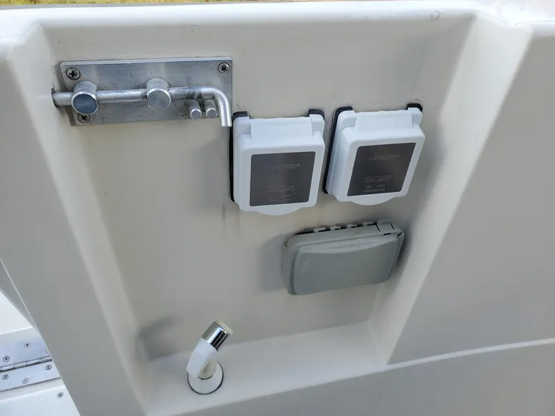 Slide: The Image of 1990 Mainship Mediterranean boat electrical outlets and fittings on deck. - 15