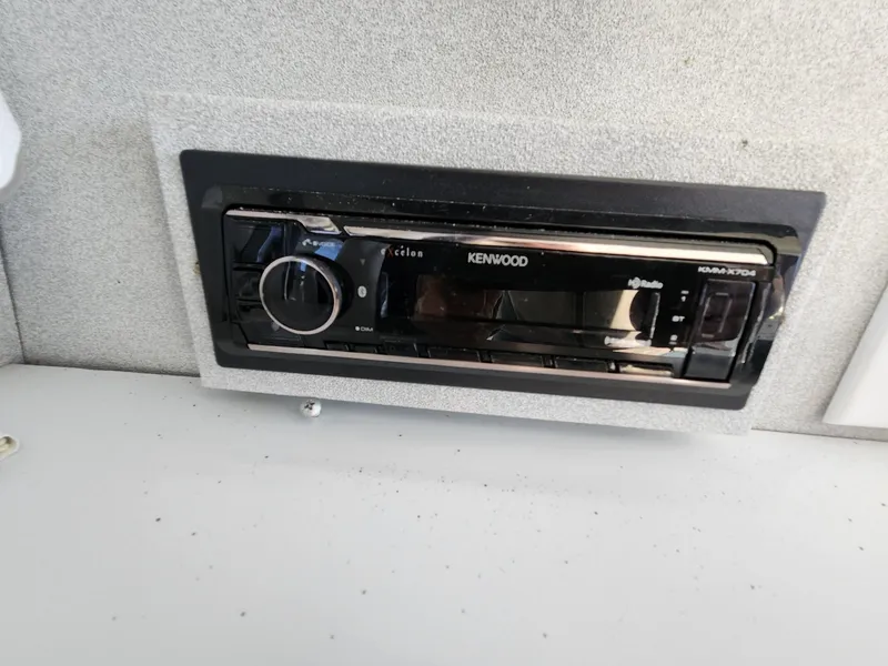 Slide: The Image of Kenwood stereo system in 1990 Mainship Mediterranean boat interior. - 7