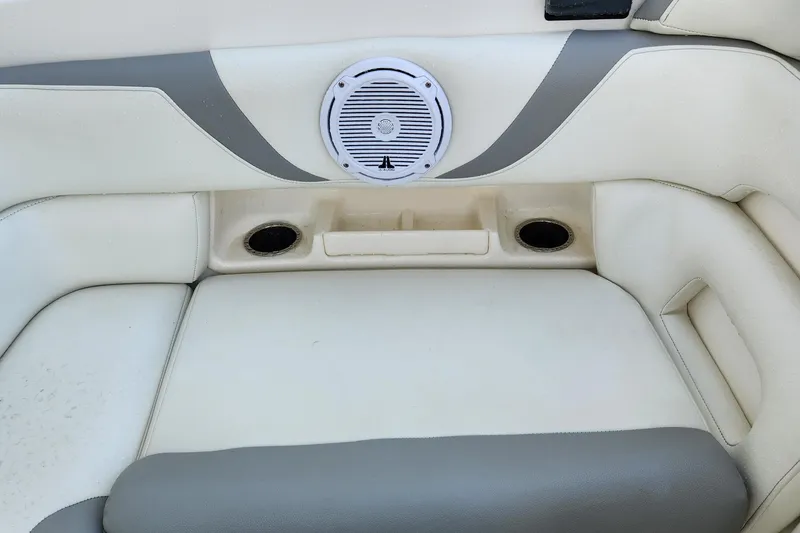 Slide: The Image of Boston Whaler 320 Outrage 2008 boat interior with speaker and cup holders. - 25