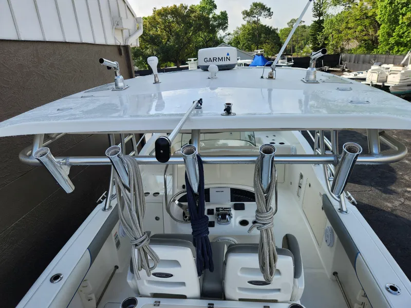 Slide: The Image of 2008 Boston Whaler 320 Outrage Cuddy Cabin with Garmin equipment, docked outdoors. - 35