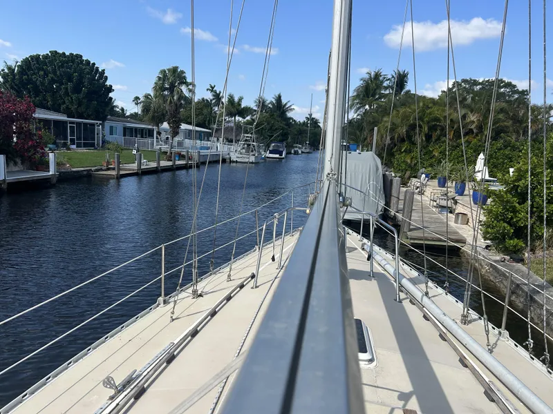 Slide: The Image of Sailing on 1986 O'Day 39 Aft Cockpit yacht in a scenic canal. - 27