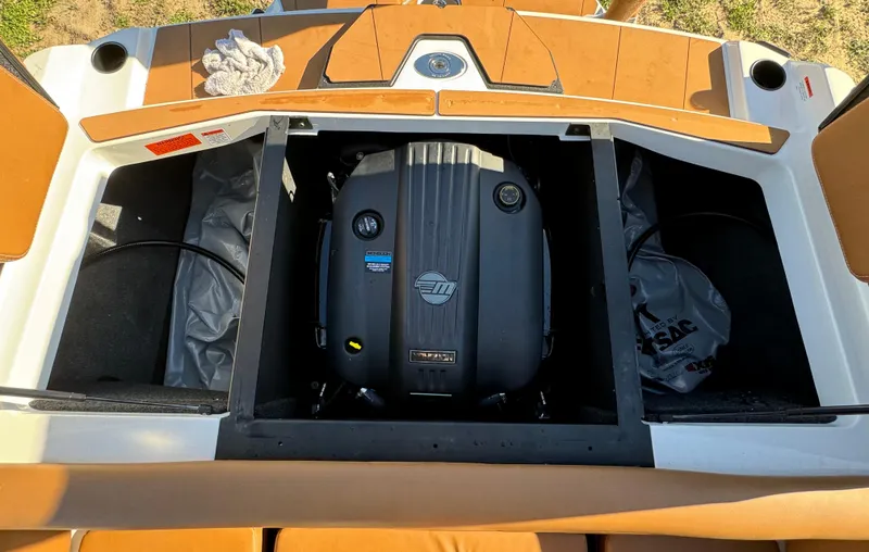 Slide: The Image of 2023 Axis A225 boat engine compartment with open hatch. - 38