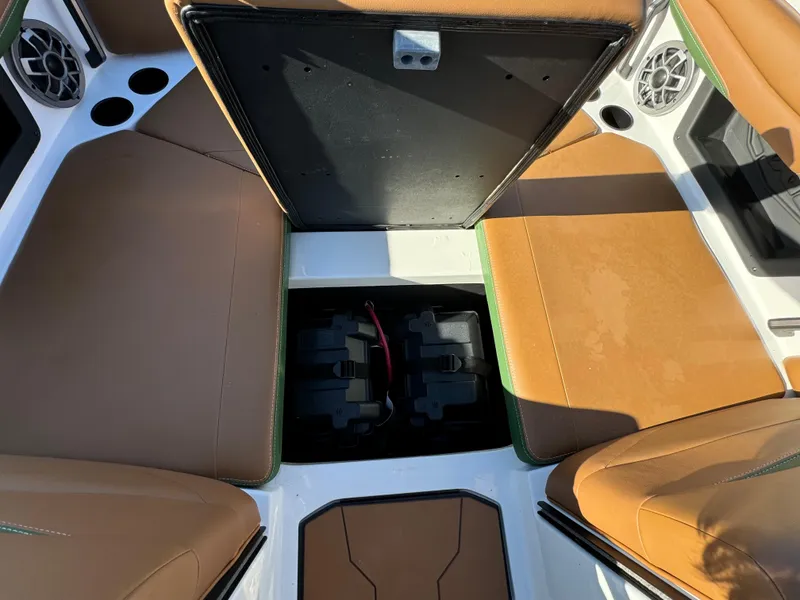 Slide: The Image of 2023 Axis A225 boat interior with open storage compartment. - 9