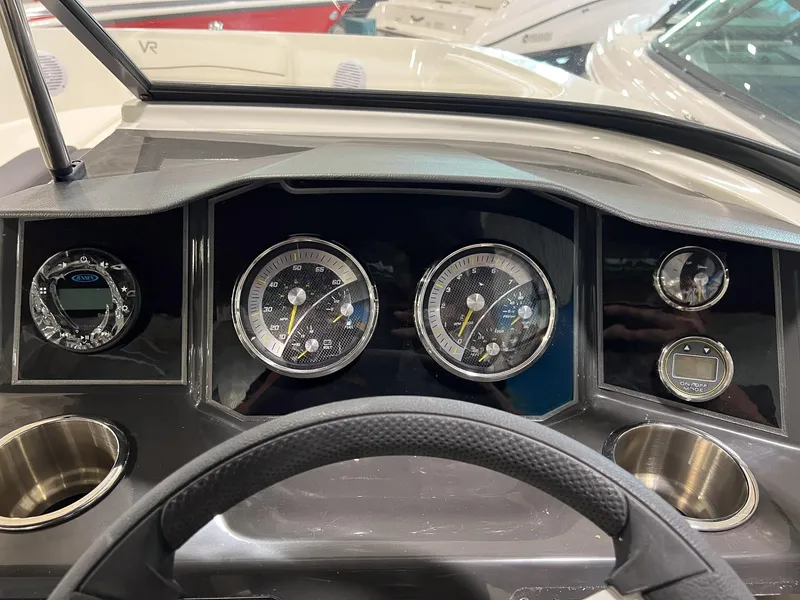 Slide: The Image of Dashboard of 2023 Bayliner VR5 Bowrider with gauges and controls. - 15