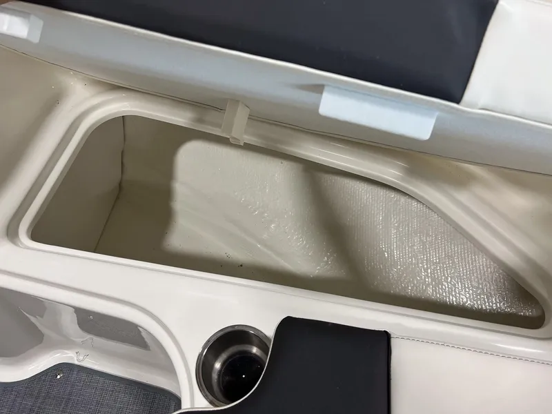 Slide: The Image of Storage compartment in 2023 Bayliner VR5 Bowrider boat. - 19