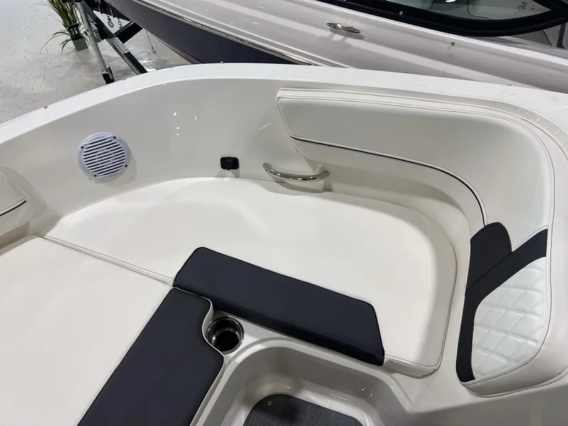 Slide: The Image of 2023 Bayliner VR5 Bowrider interior seating area with speaker and cup holder. - 20