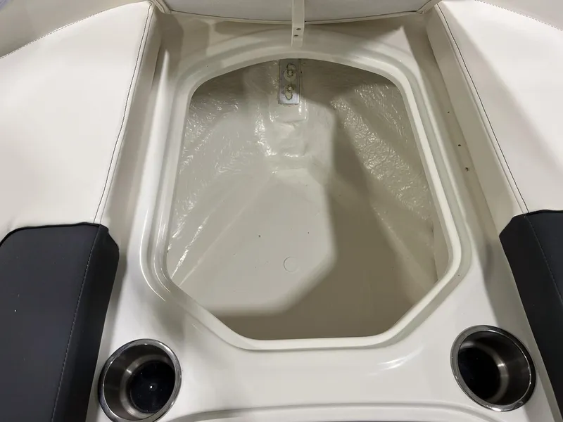 Slide: The Image of Storage compartment in 2023 Bayliner VR5 Bowrider boat with cup holders. - 22