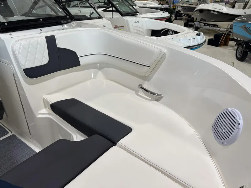 Slide: The Image of 2023 Bayliner VR5 Bowrider interior seating and speaker detail. - 8