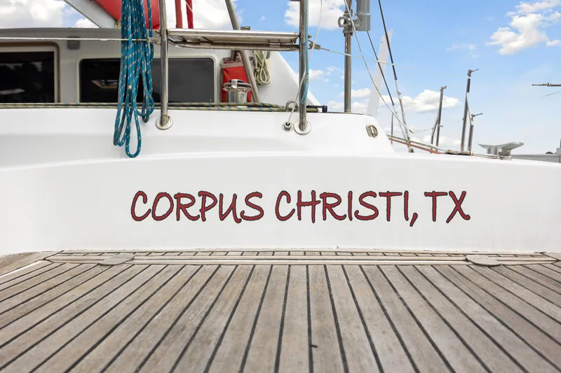 Slide: The Image of Sailboat docked with Corpus Christi, TX on the stern, Switch 55 model, 2006. - 23