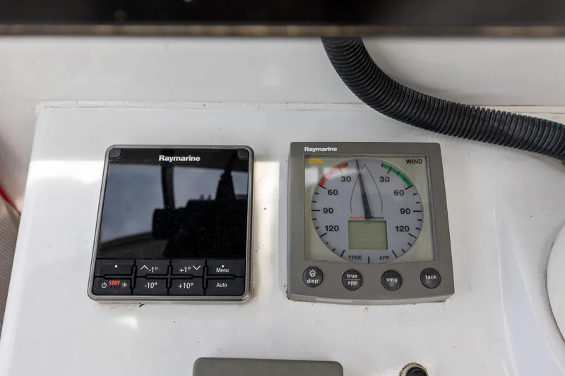 Slide: The Image of Raymarine navigation instruments on a 2006 Switch 55 boat. - 39