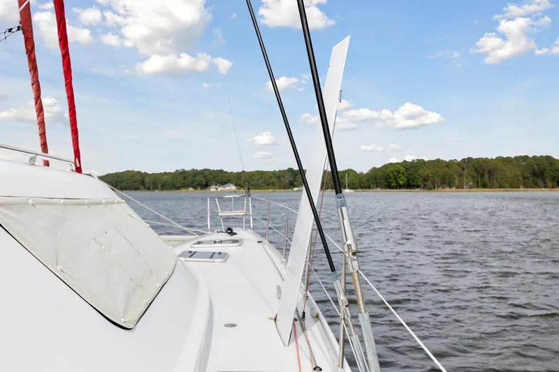 Slide: The Image of Sailboat on a calm lake with a clear sky, Switch 55 model, 2006. - 47