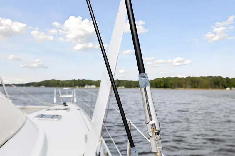 Slide: The Image of Sailing on a 2006 Switch 55 catamaran with scenic lake view. - 48