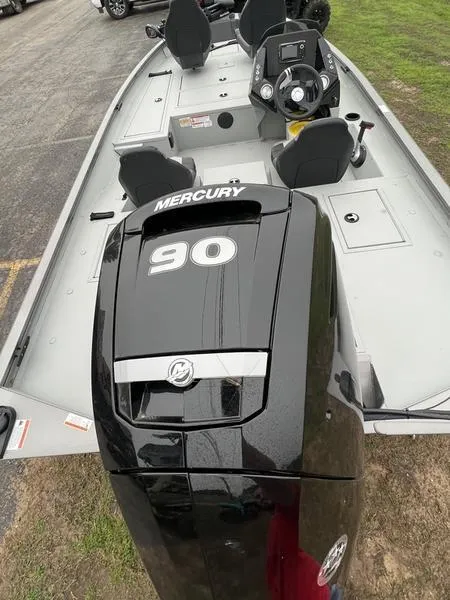 Slide: The Image of 2023 Crestliner XFC 179 boat with Mercury 90 engine, interior view. - 3