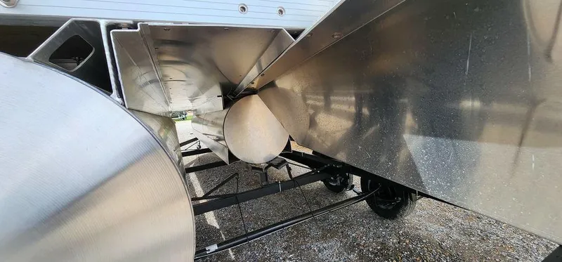 Slide: The Image of Close-up of 2023 Bennington 23 SXSR pontoon boat undercarriage, showcasing aluminum structure and pontoons. - 17