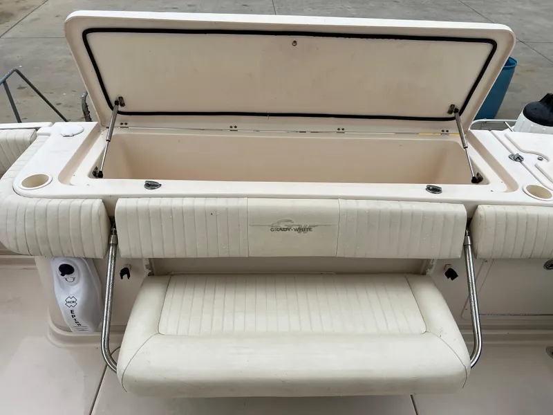 Slide: The Image of 2007 Grady-White Express 360 boat with open storage compartment and cushioned seating. - 20