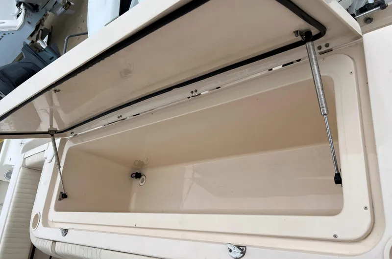 Slide: The Image of Open storage compartment on 2007 Grady-White Express 360 boat. - 21