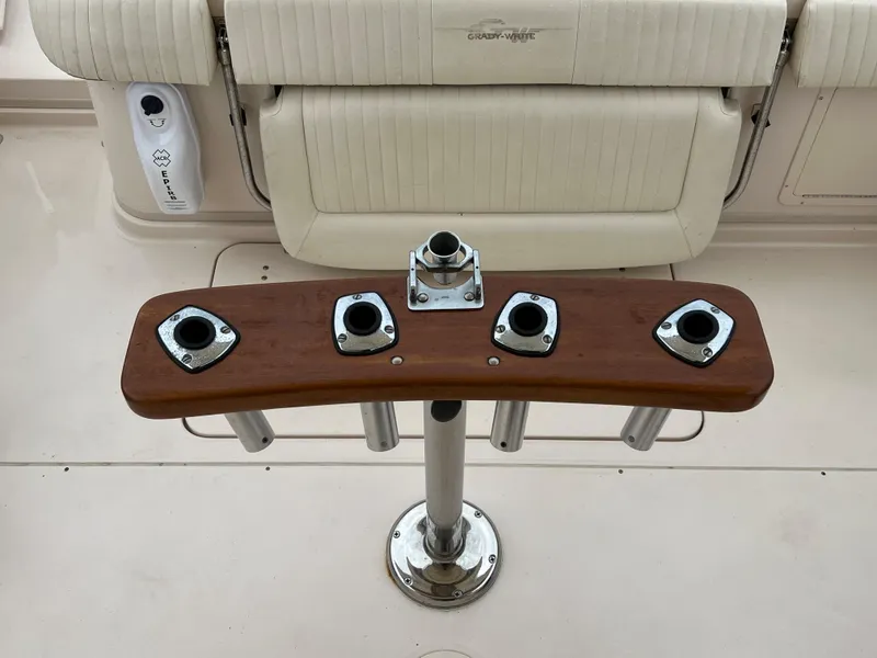 Slide: The Image of 2007 Grady-White Express 360 boat with rod holders and cushioned seating. - 23