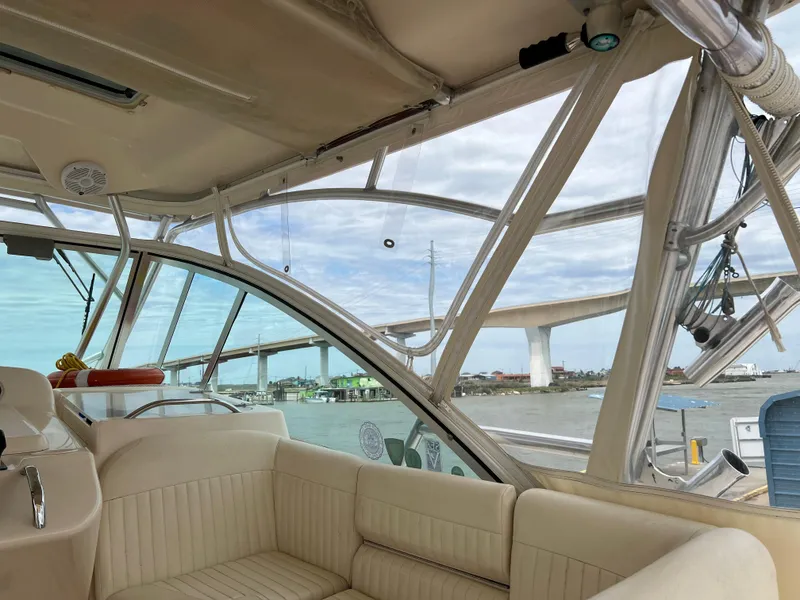 Slide: The Image of Interior view of 2007 Grady-White Express 360 boat with bridge in background. - 26