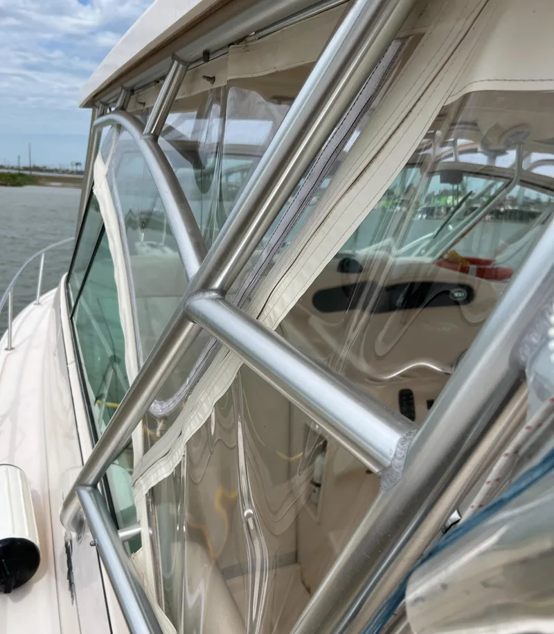 Slide: The Image of 2007 Grady-White Express 360 boat with clear windows and sturdy metal frame. - 27