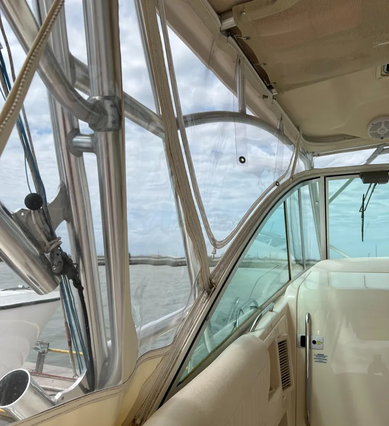 Slide: The Image of 2007 Grady-White Express 360 boat interior with clear windows and ocean view. - 28