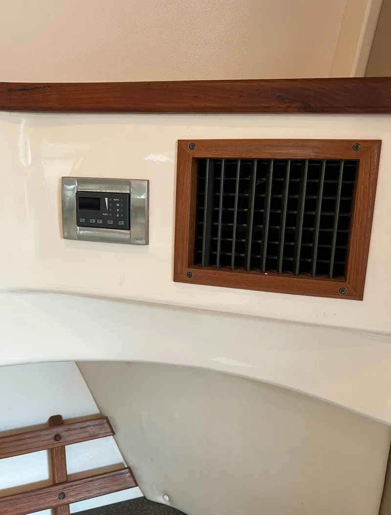 Slide: The Image of 2007 Grady-White Express 360 interior with control panel and vent. - 33