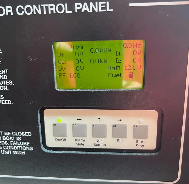 Slide: The Image of Control panel display on a 2007 Grady-White Express 360 boat, showing battery and fuel status. - 38