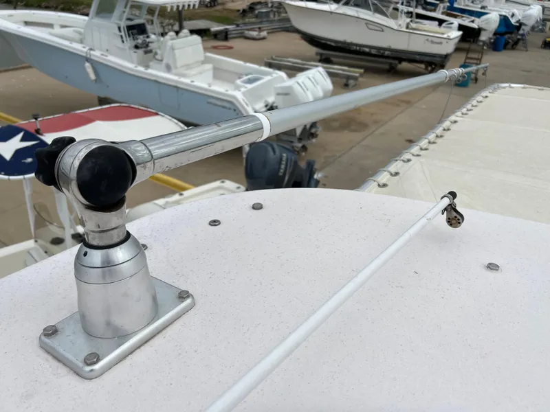 Slide: The Image of 2007 Grady-White Express 360 boat detail with docked vessels in background. - 42