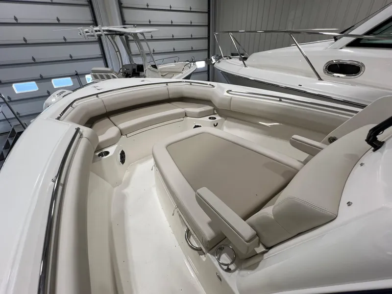 Slide: The Image of 2025 Boston Whaler 280 Outrage boat interior with spacious seating. - 10